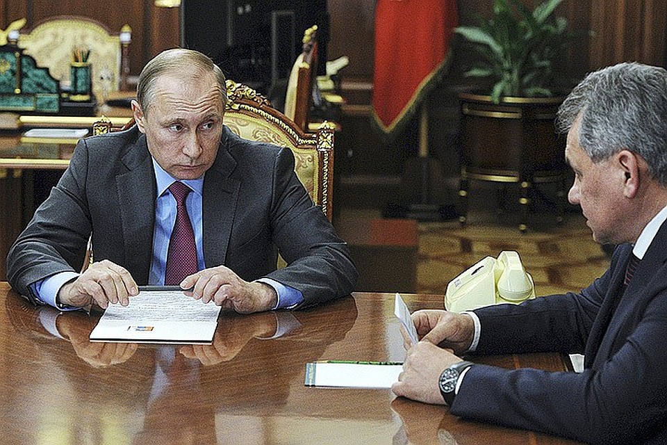 Президент Путин и глава Министерства обороны РФ Сергей Шойгу на совещании, посвященном выводу войск Фото: REUTERS