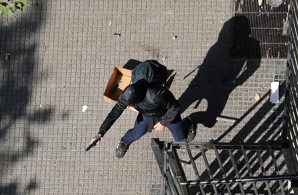 Массовые беспорядки охватили столицу Чили. Фото: REUTERS