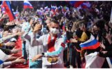 Большунов и Щербакова подняли флаг России на церемонии чествования олимпийцев 